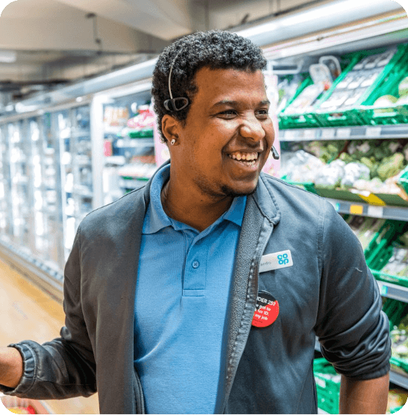 Smiling employee working in a retail environment