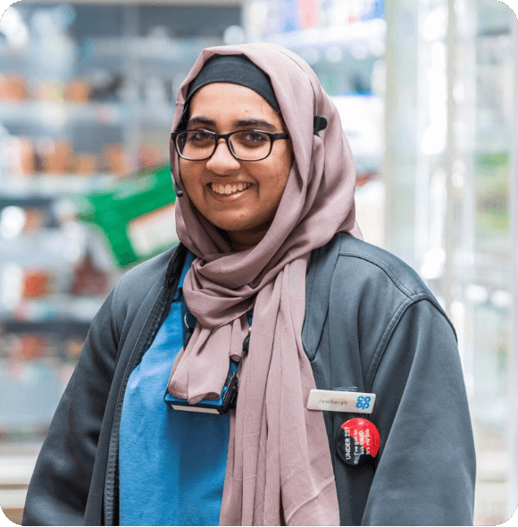 Smiling employee working in a retail environment