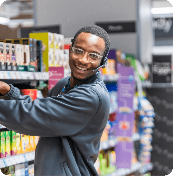 Smiling employee working in a retail environment