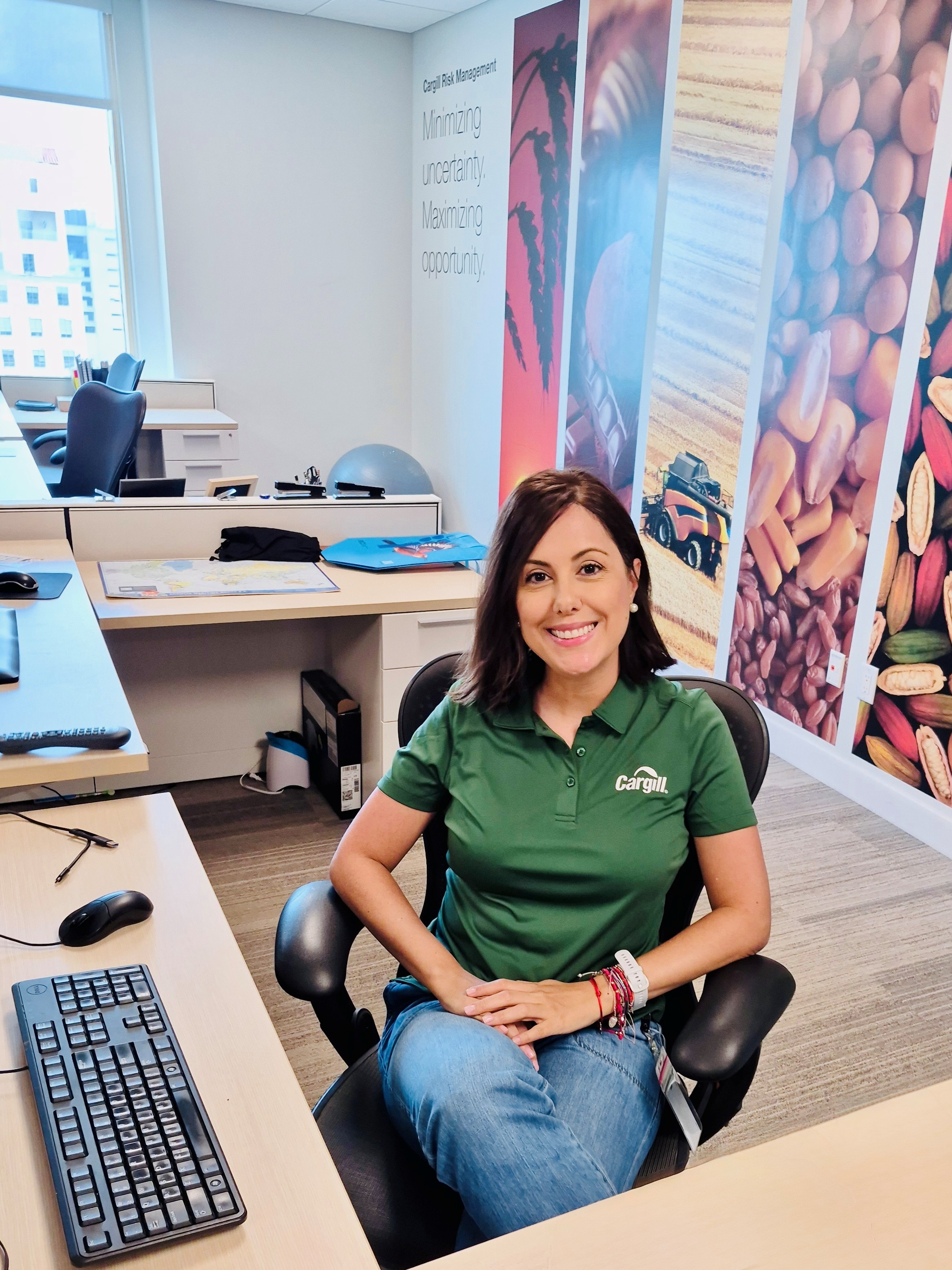 Employee seated at a workstation in a modern Cargill office, supporting talent acquisition and recruitment activities.