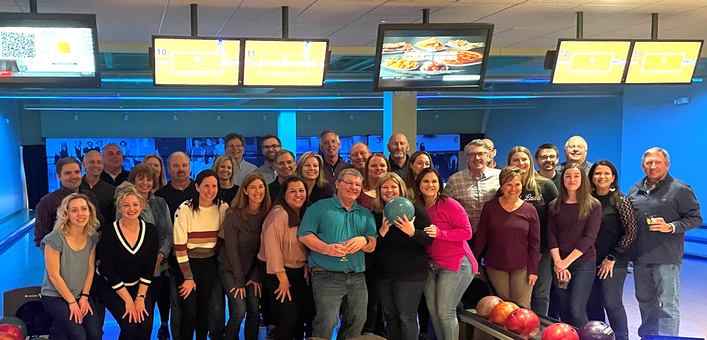 group of employees bowling