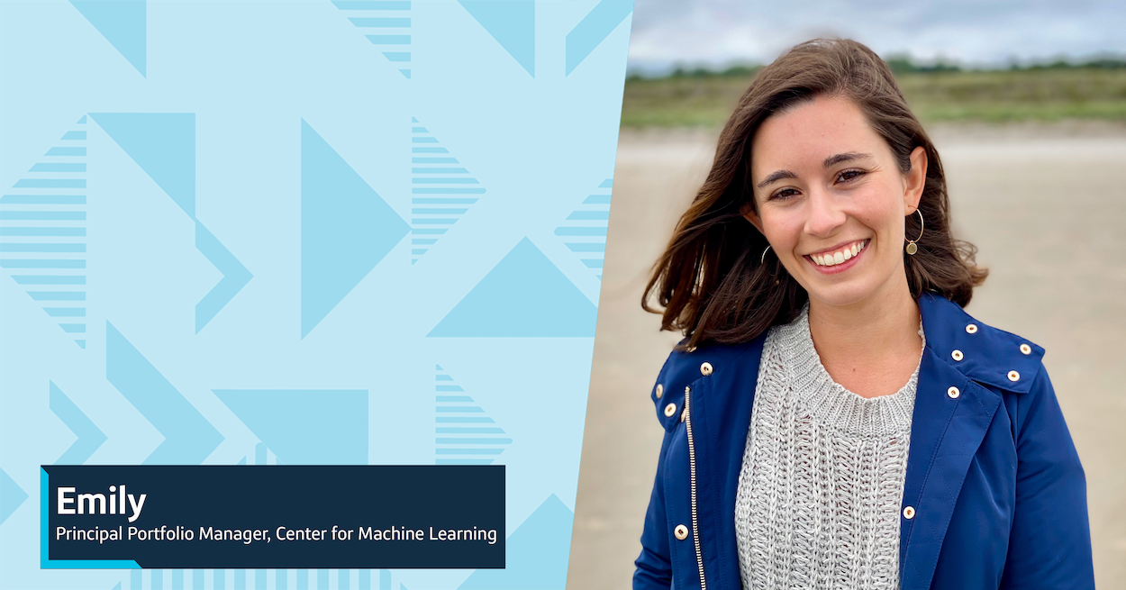 Emily, Capital One Principal Portfolio Manager, Center for Machine Learning, stands outside