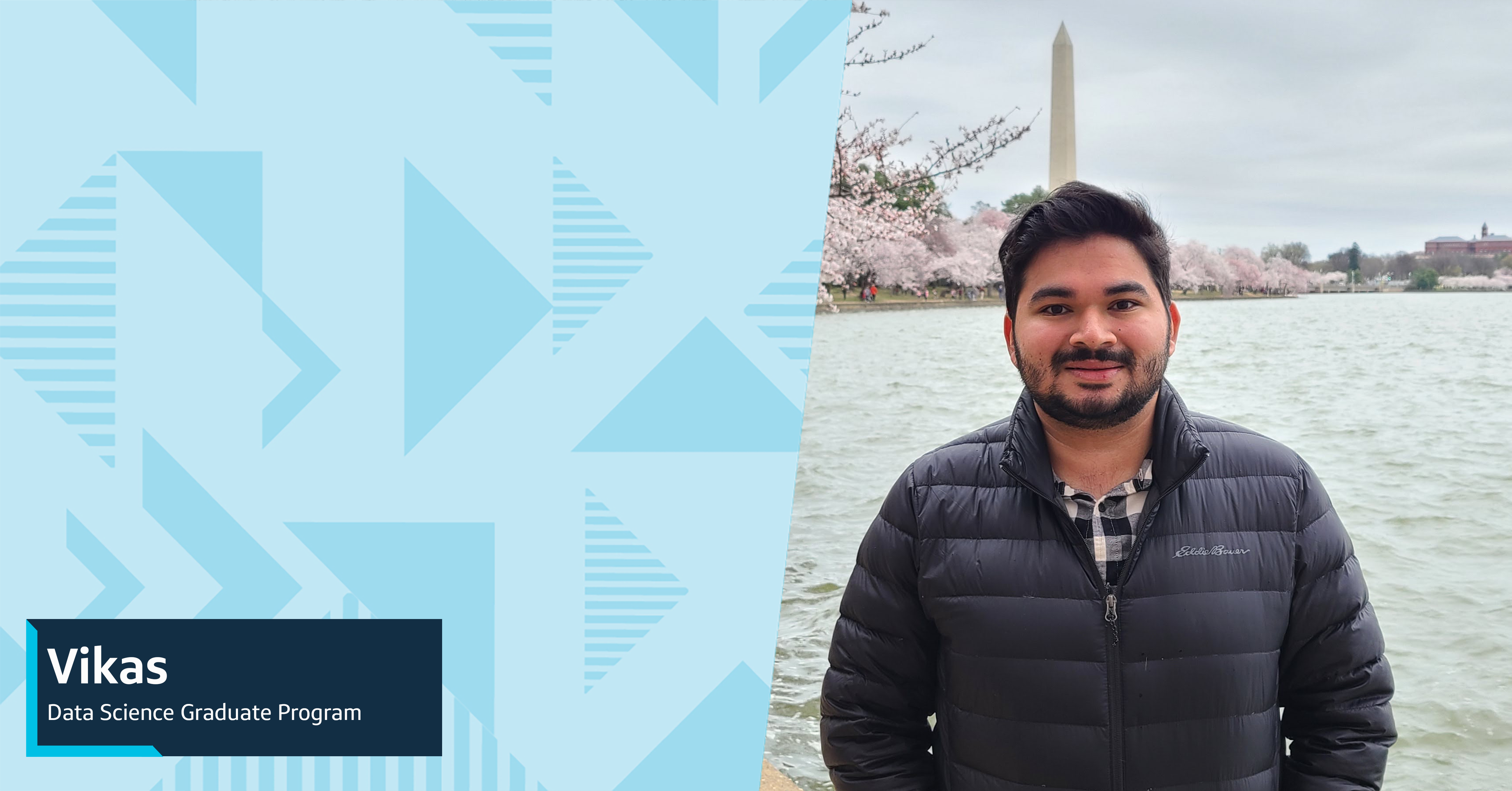 Vikas, Capital One Data Science Graduate Program associate, stands in front of a river in front of the Washington Monument in D.C.