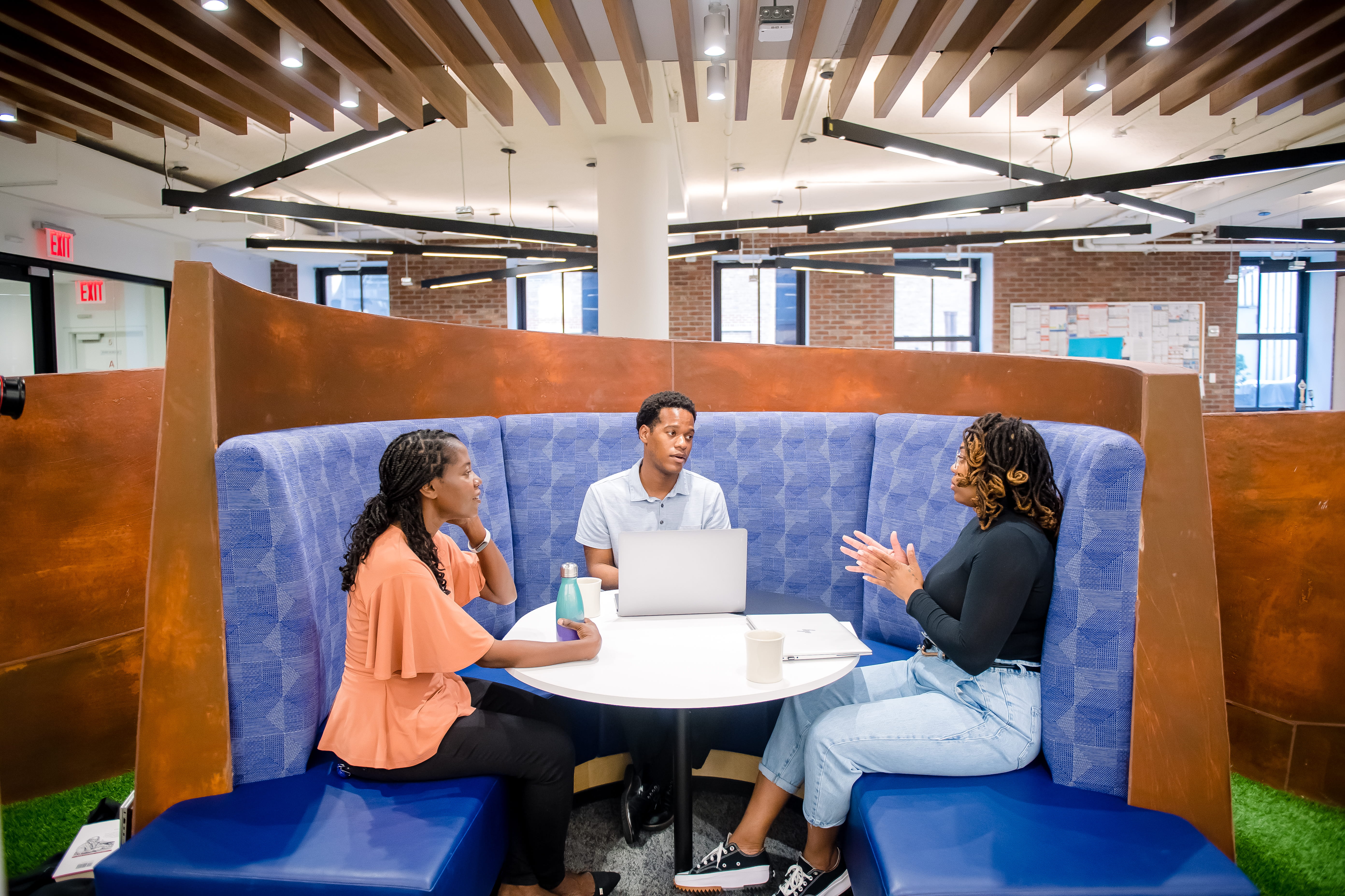 associates talking at a table