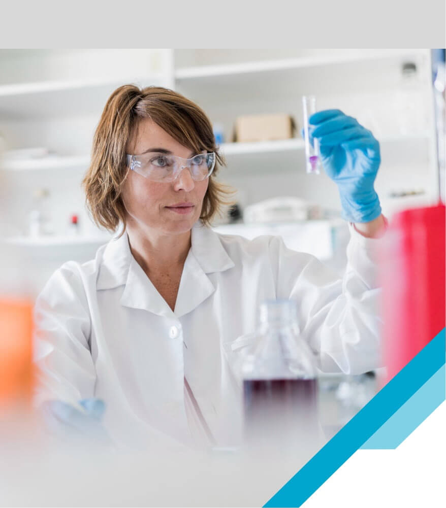 Female Chemist Examining Sample In Test