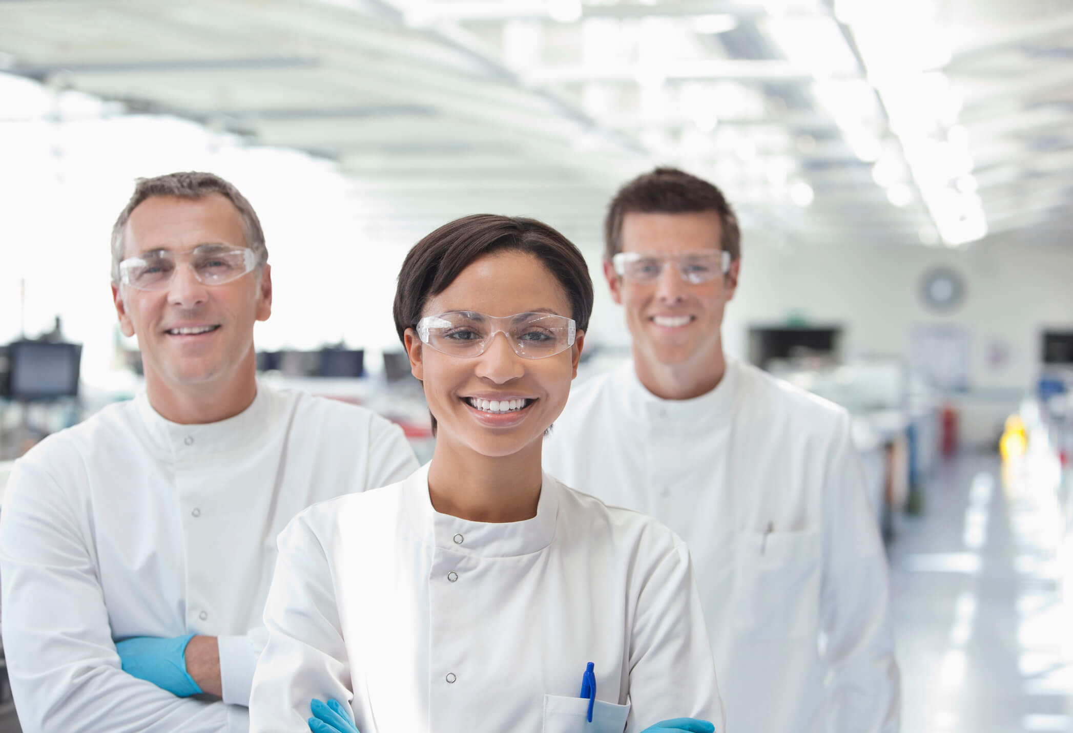 three scientists standing together