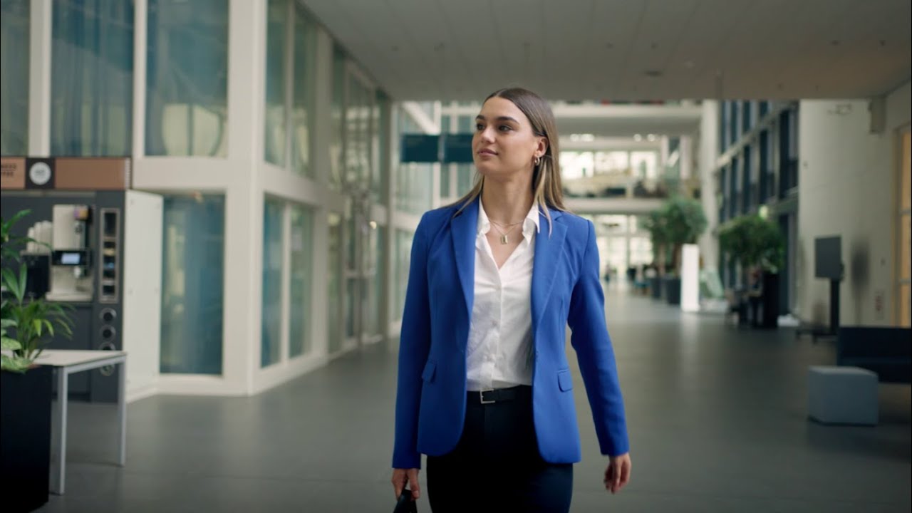 Woman walking into office