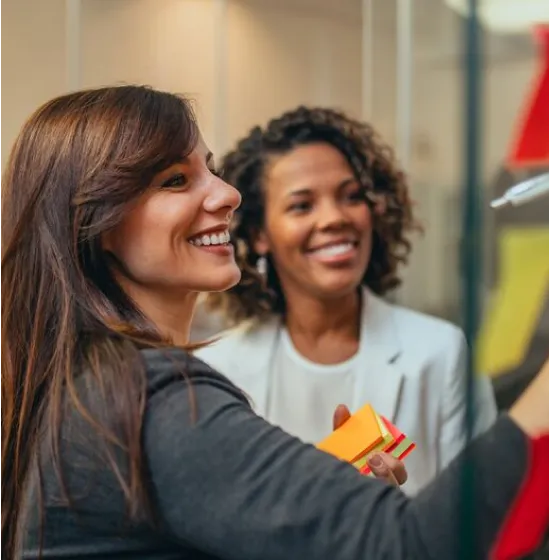 Two woman smiling