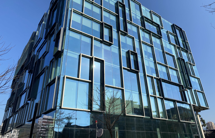 Stout, square buildings with large reflective windows