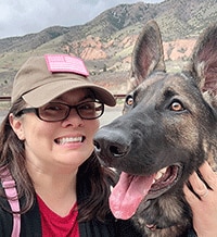 Woman with her dog hiking