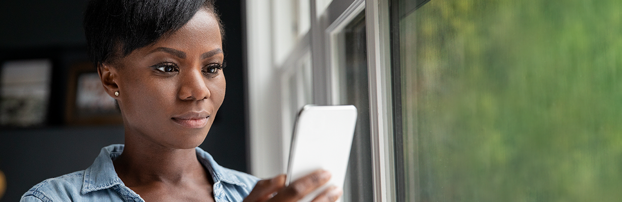 Woman looking at smartphone