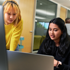 colleagues working at desk