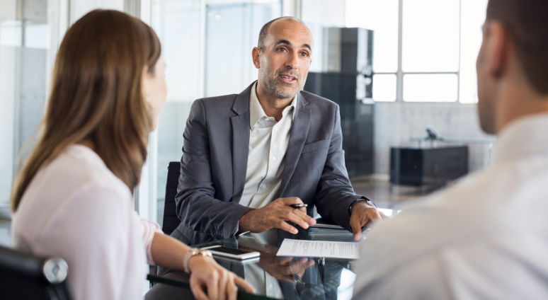 Three people having conversation