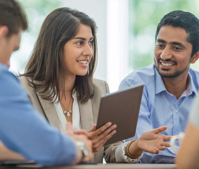 Woman presenting in a meeting