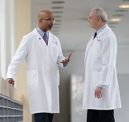 two physicians talking