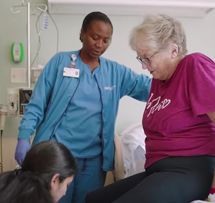 Two nurses laughing