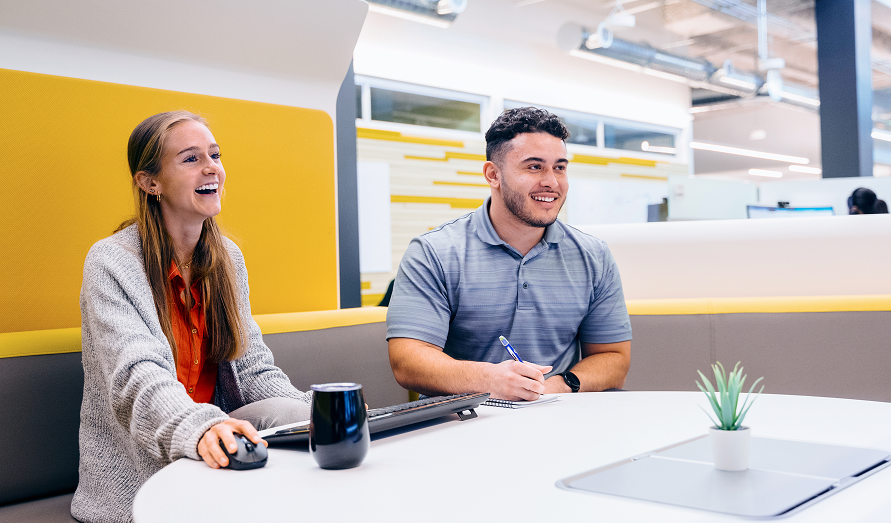 Two interns collaborating on a project