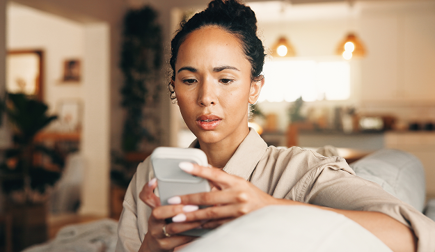 Woman looking at her smartphone