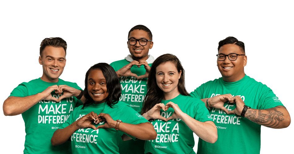group of employees wearing green 'ready to make a difference' t-shirts and making heart signs with their hands