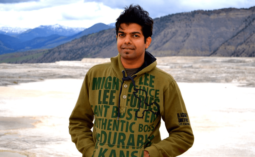 photo of Nishant outdoors with mountains in the background