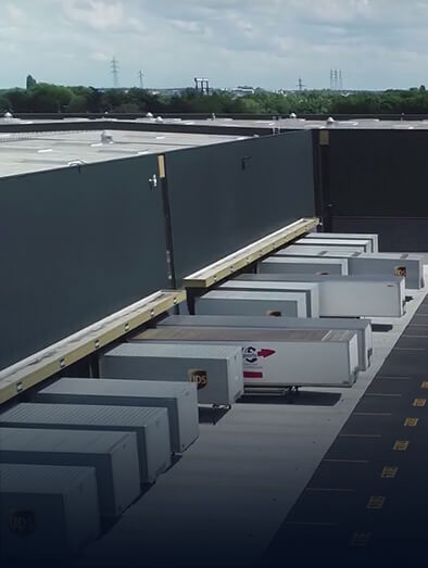 Depot with several trucks inside it