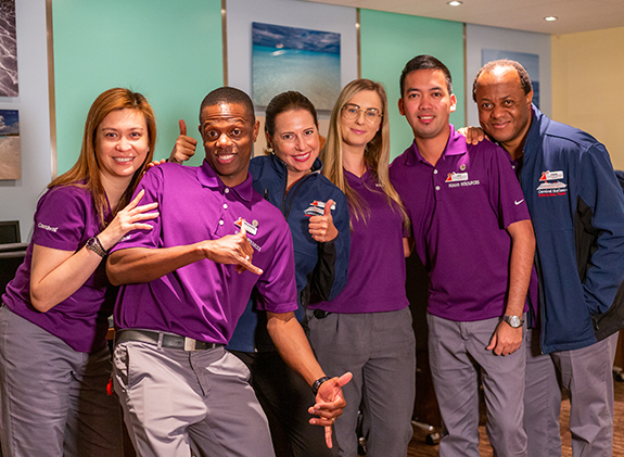crew photoshoot with purple shirts