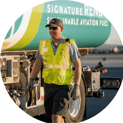 Man walking past a fuel truck