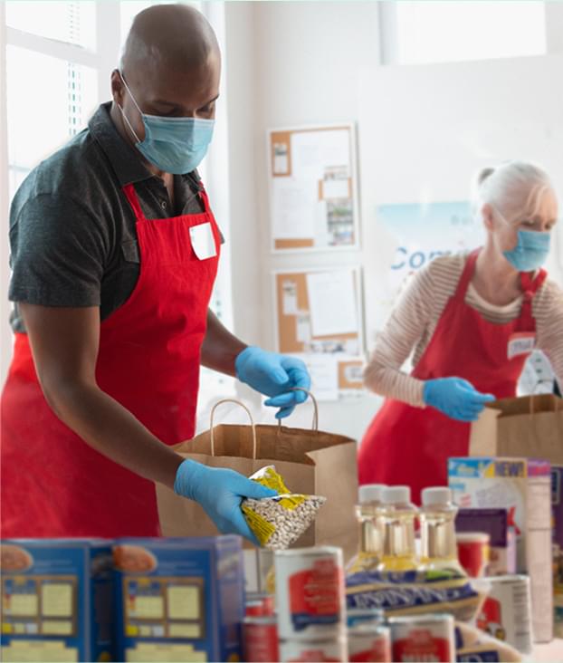 man and woman volunteering