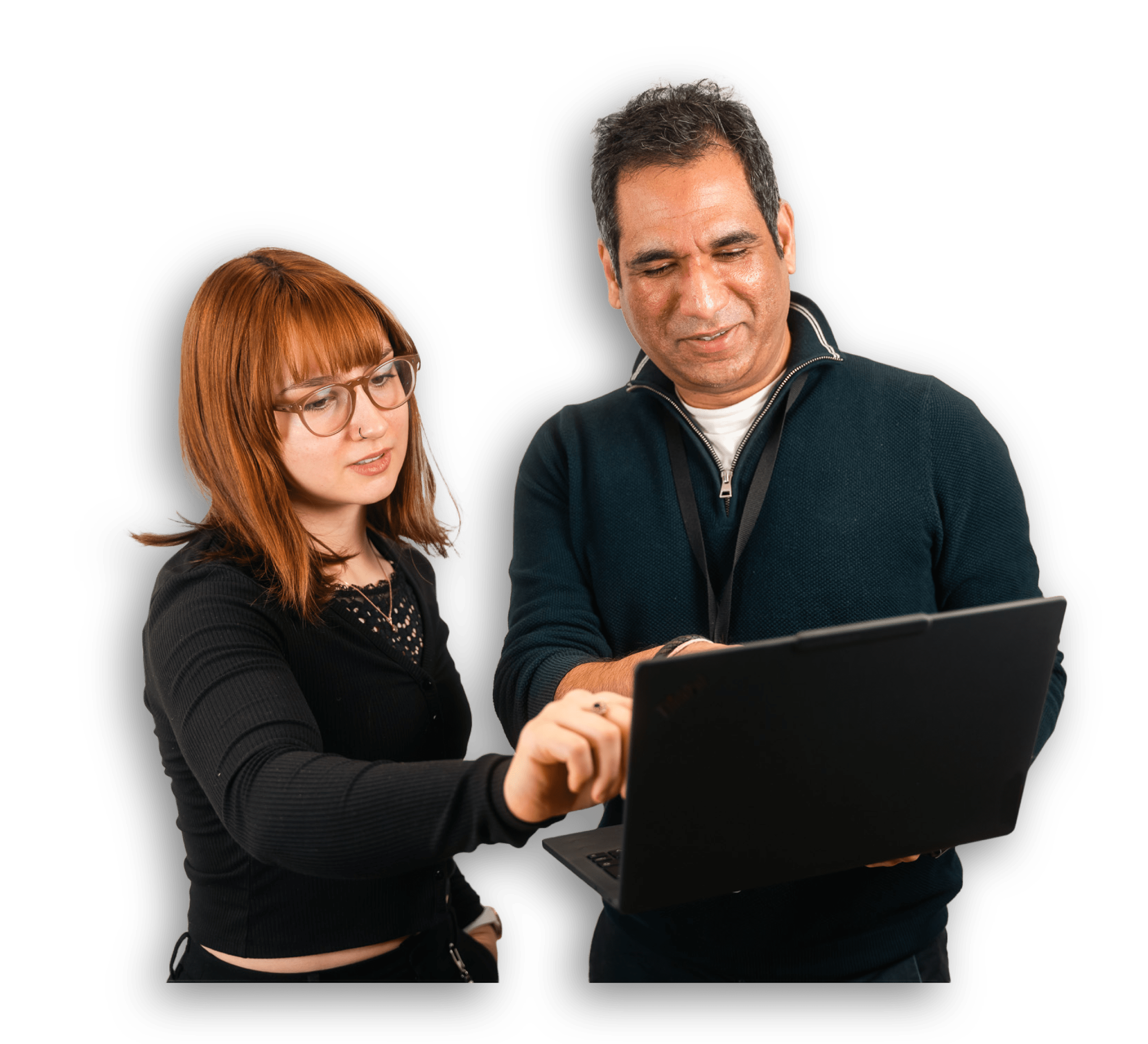 man and woman looking at computer screen