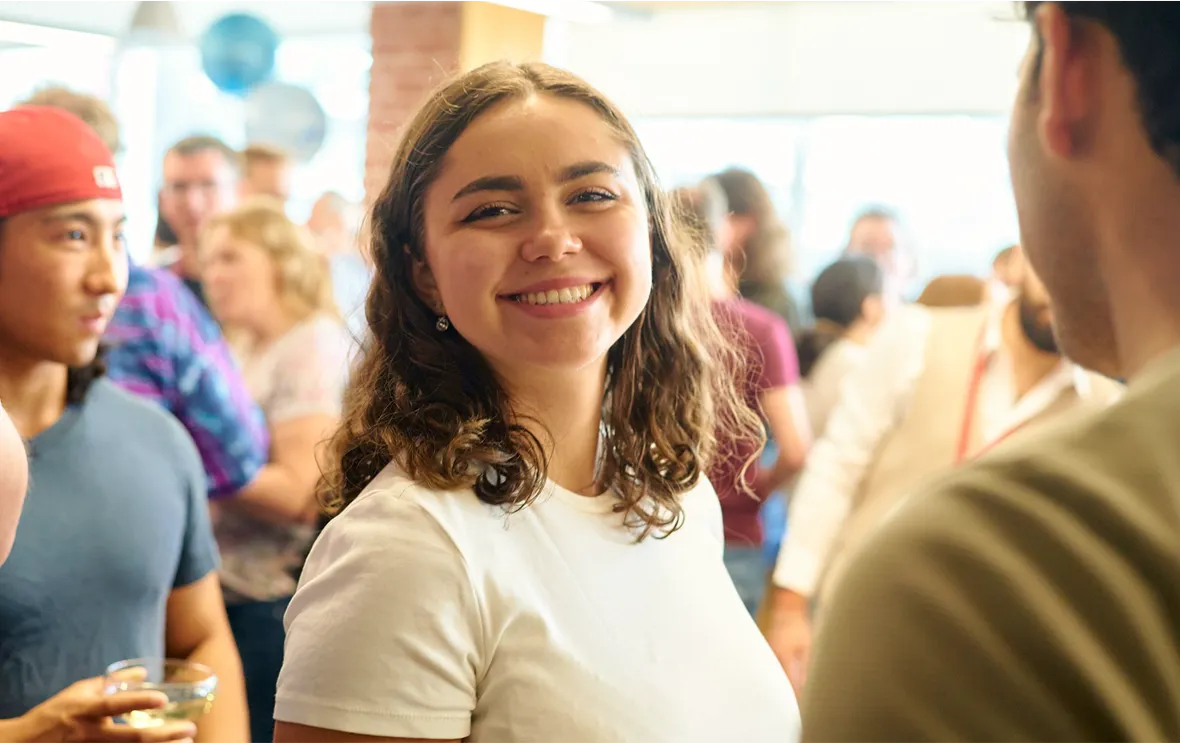 Woman smiling warmly.