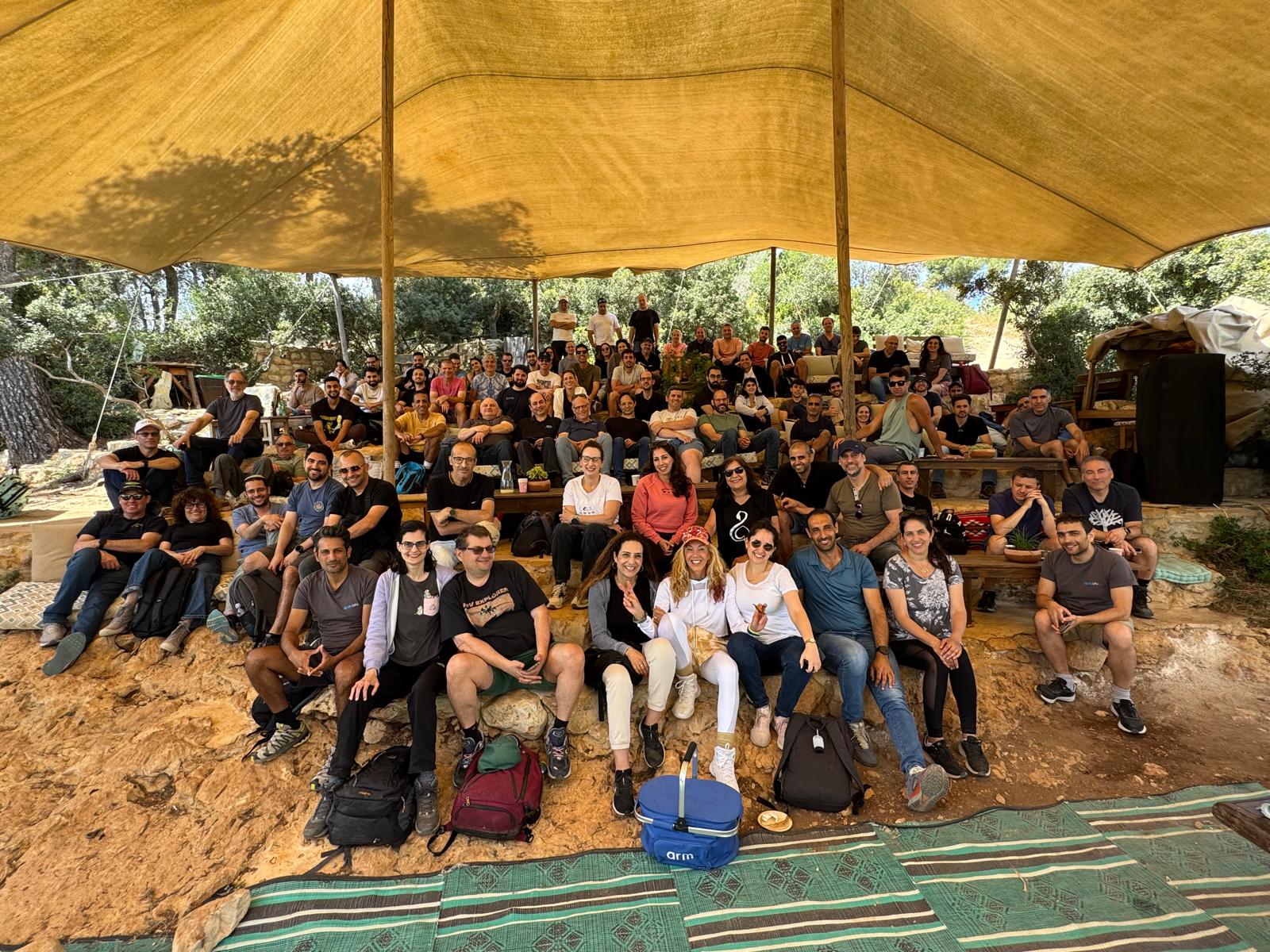 Woman working at a desk with a computer.
