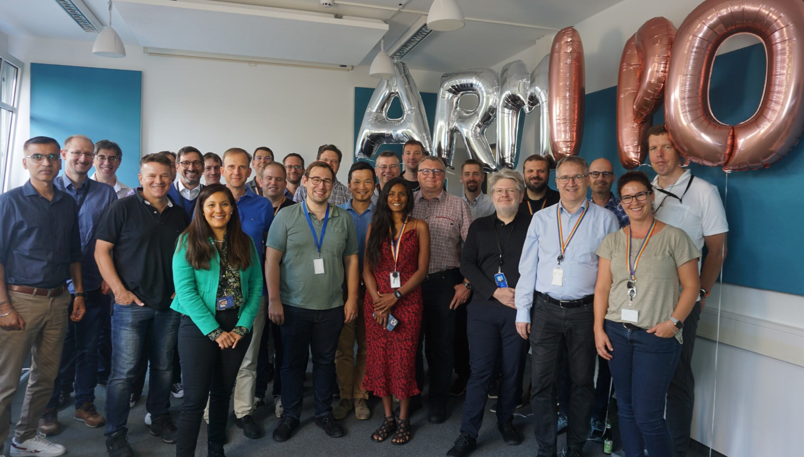 Group of colleagues celebrating ARM 110 event.