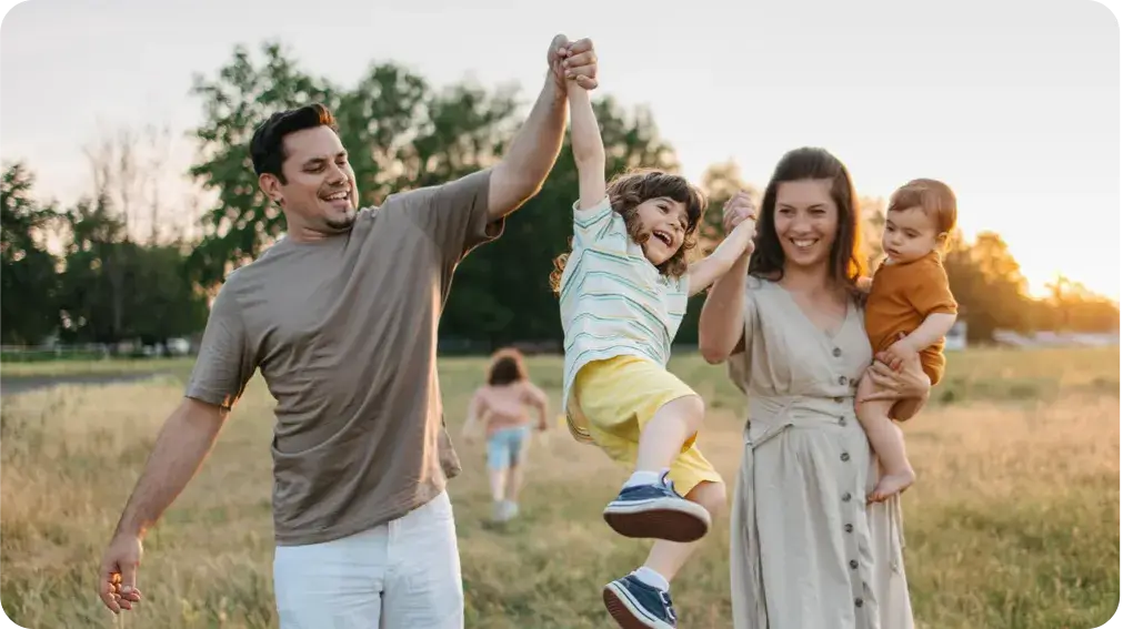 family having fun in a field