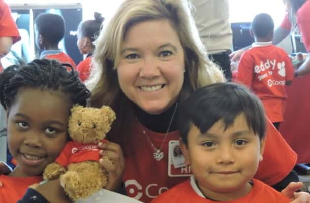 Woman with two children from the community