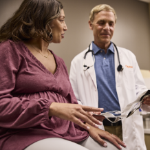 Patient speaking with a doctor during a medical appointment