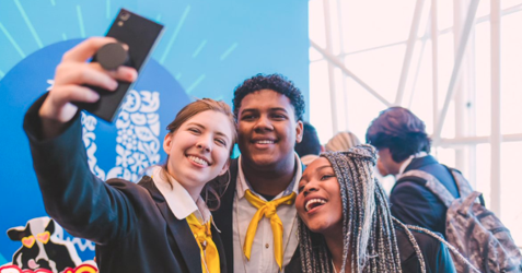 A group of 3 young people taking a selfie