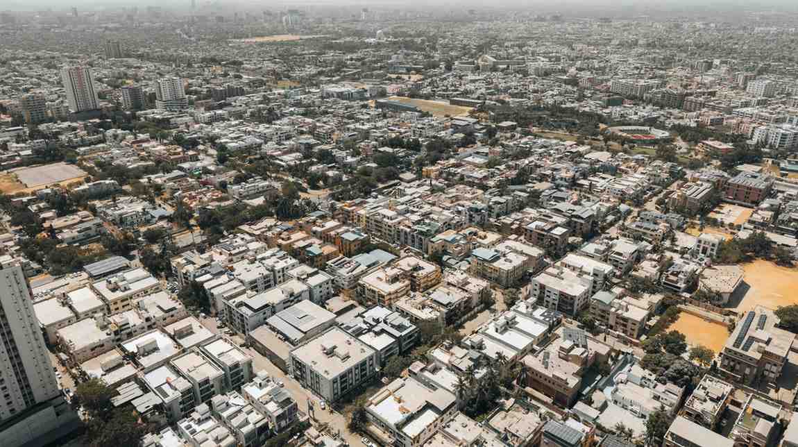 Aerial view of dense city buildings and streets