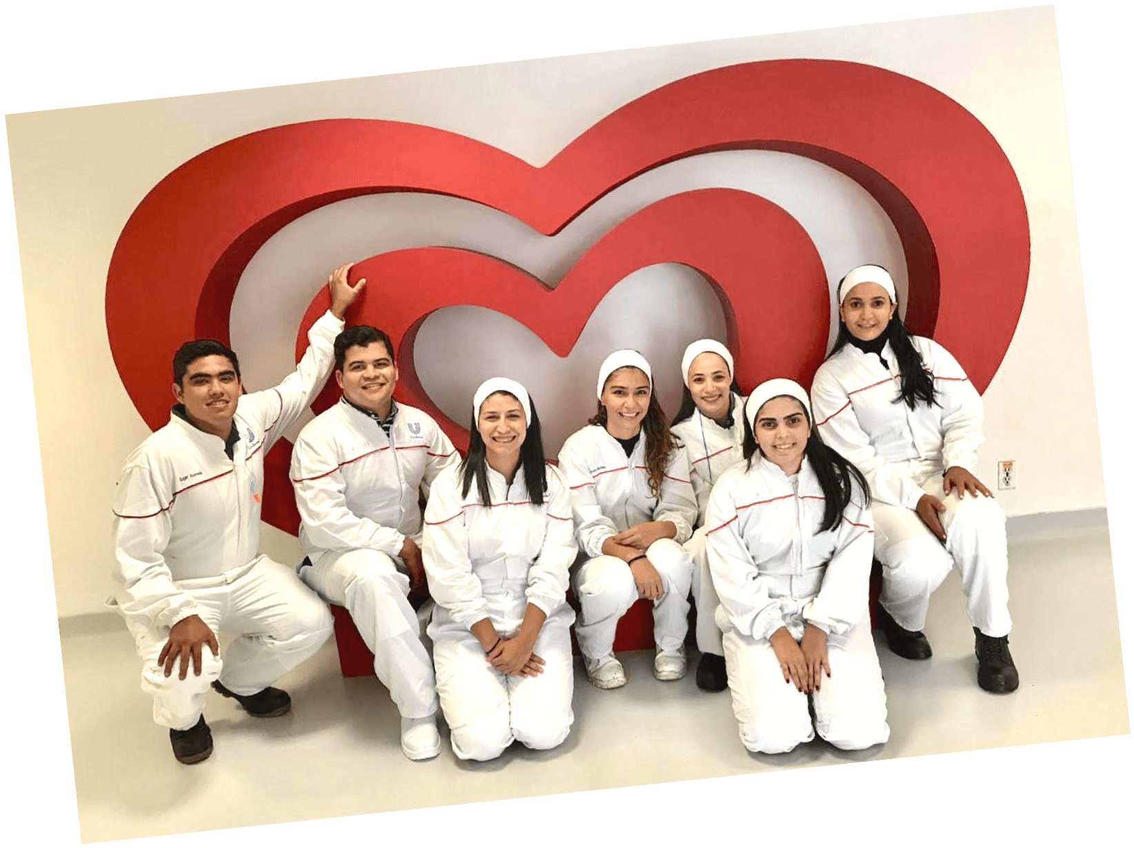 Unilever employees in front of the Wall's logo
