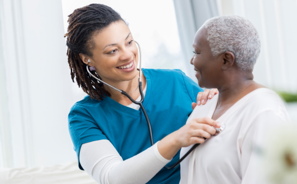 Image of nurse and patient