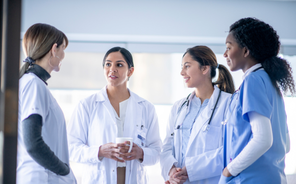 Image of hospital employees in conversation