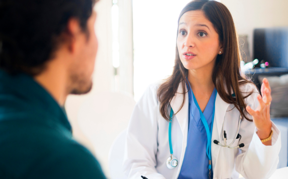 Doctor talking to patient