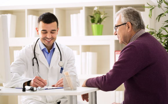 Image of doctor talking to patient