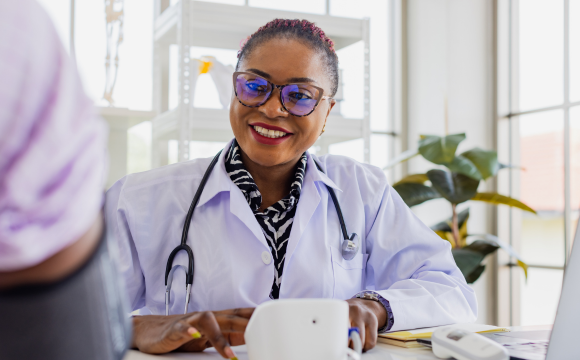 Image of doctor talking to patient