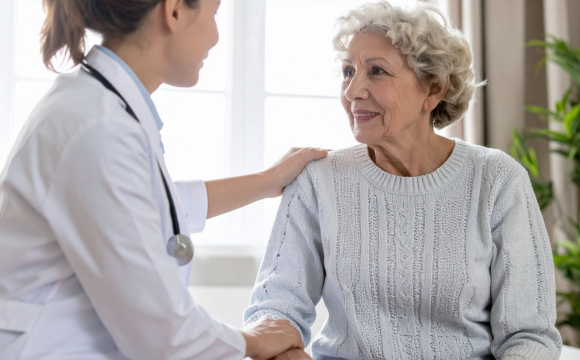 Image of doctor comforting patient
