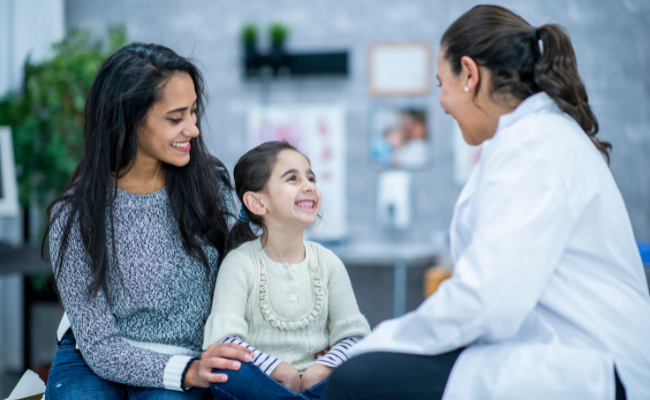 image of provider with pediatric patient
