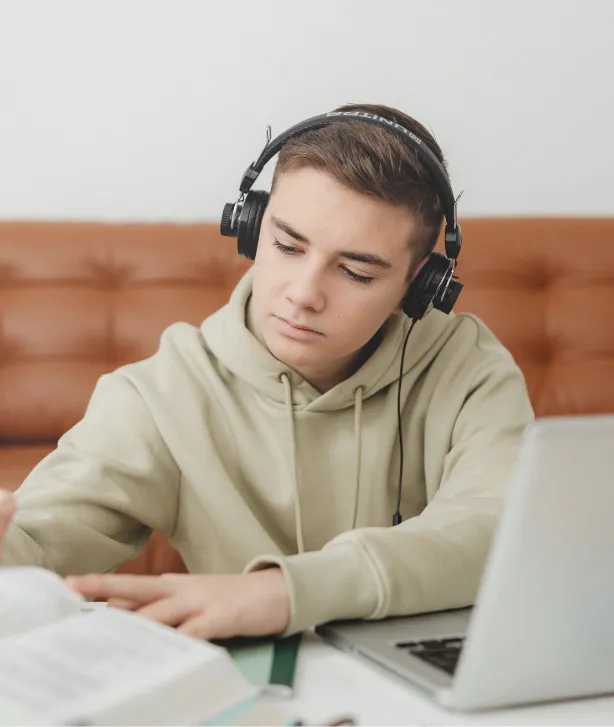 High school student working at a computer