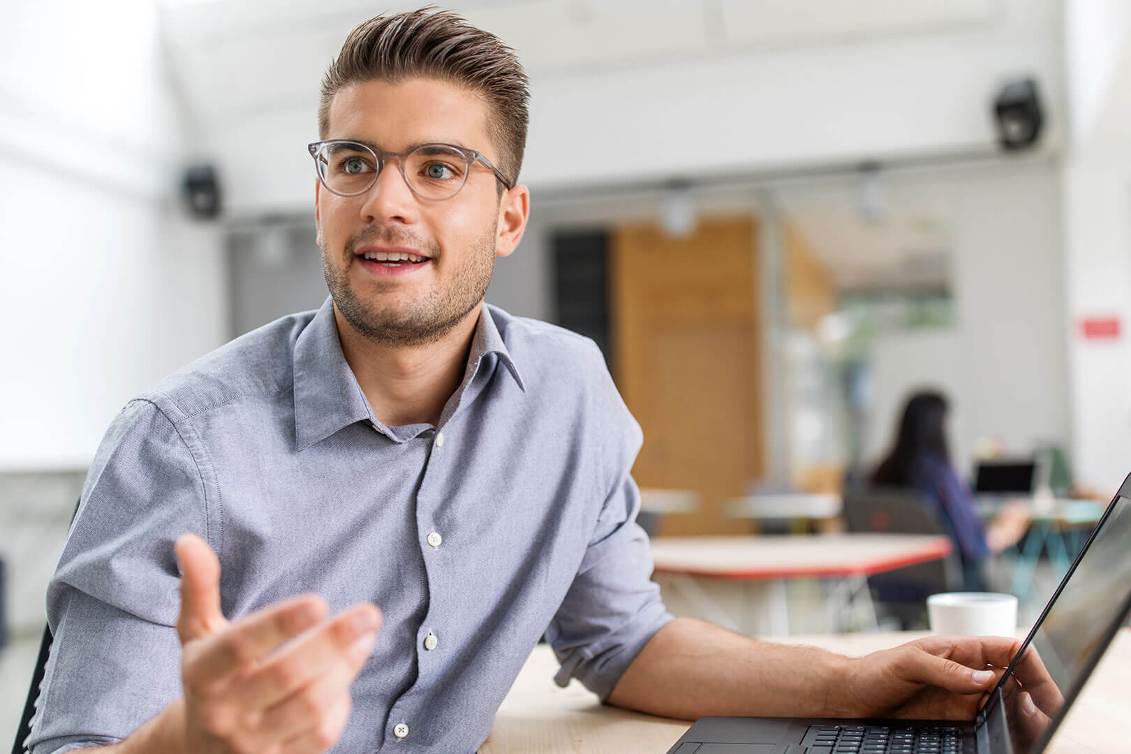 Group of men and women standing together and smiling