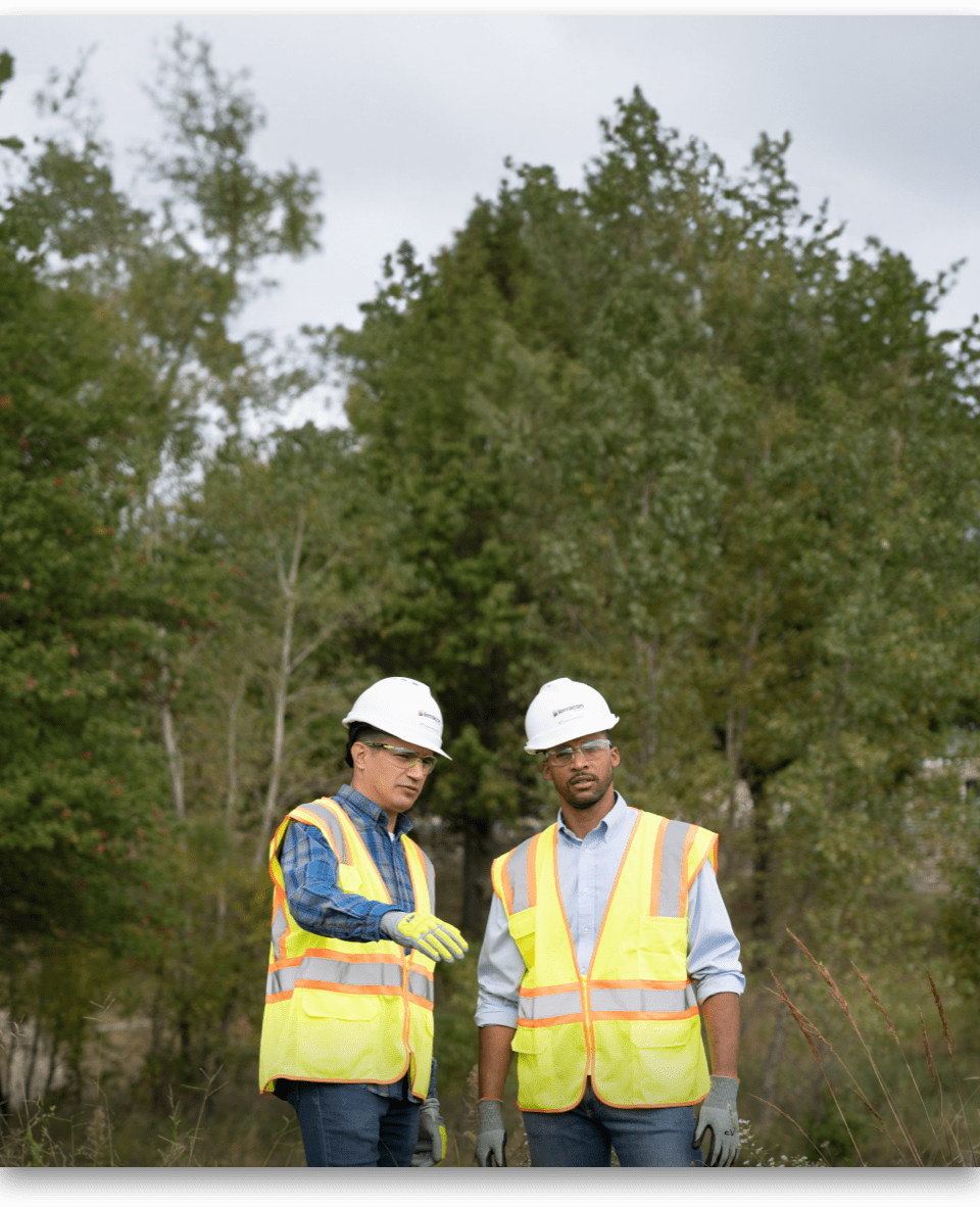 two men working in field