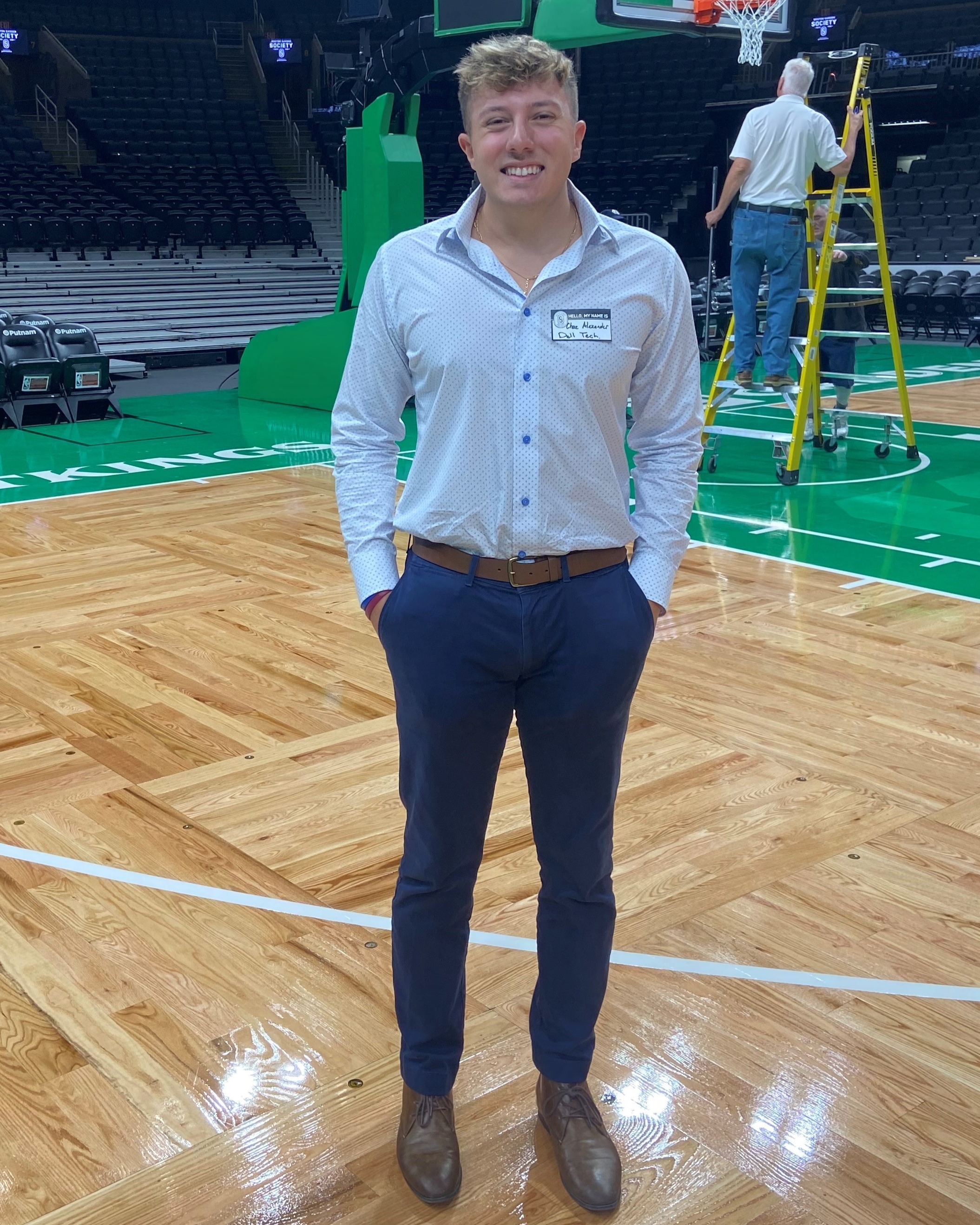 Chaz standing on the Celtics basketball court