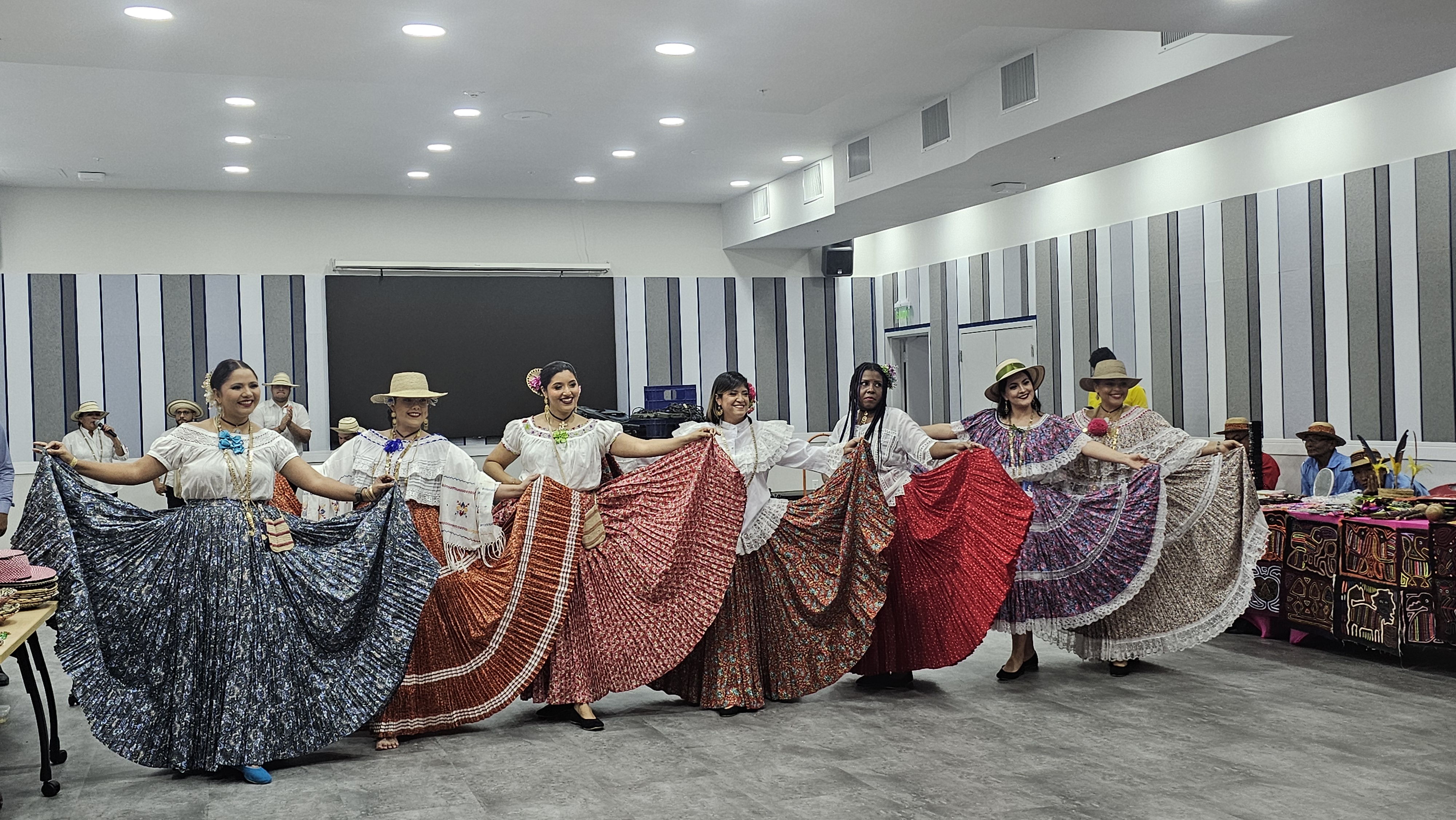 Farah and other dancers together in cultural attire